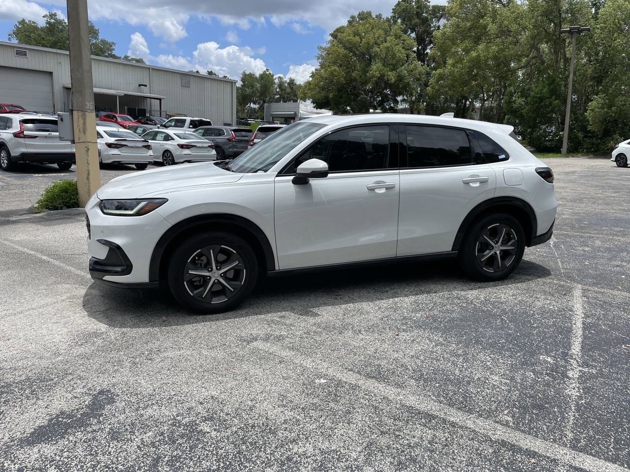 Used 2023 Honda HR-V EX-L with VIN 3CZRZ1H7XPM710044 for sale in Orange City, FL