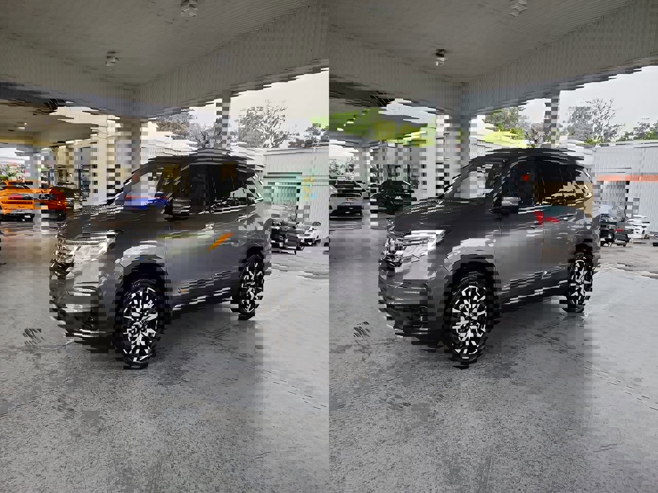 Certified 2022 Honda Pilot Touring with VIN 5FNYF5H61NB013534 for sale in Orange City, FL