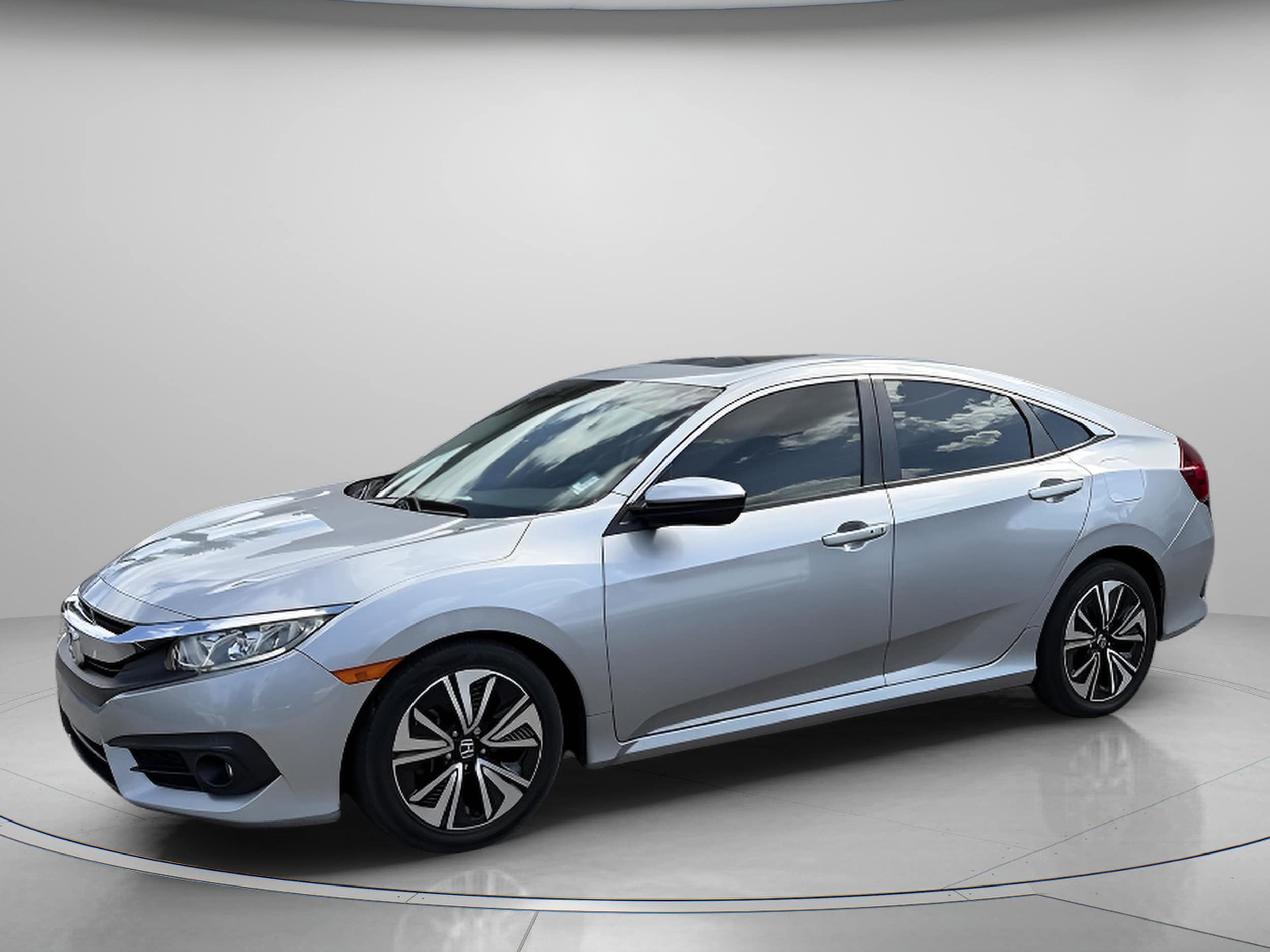 Used 2018 Honda Civic EX-T with VIN JHMFC1F35JX011477 for sale in Orange City, FL
