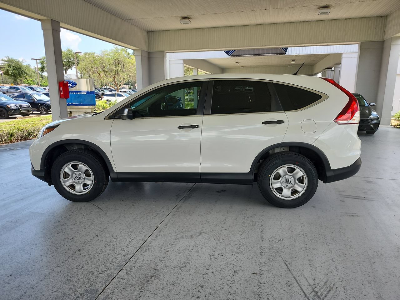 Used 2014 Honda CR-V LX with VIN 5J6RM4H31EL050049 for sale in Orange City, FL