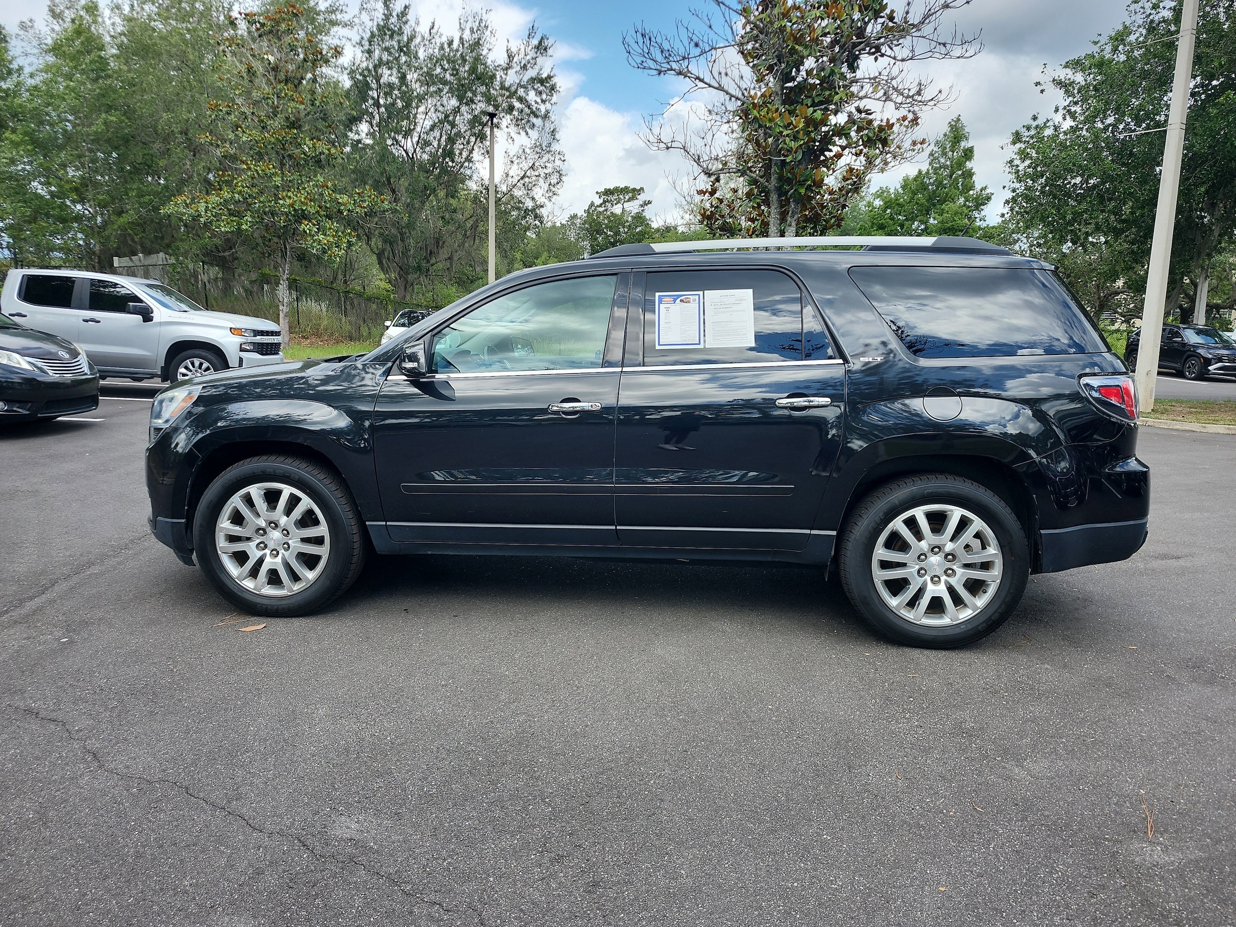 Used 2015 GMC Acadia SLT1 with VIN 1GKKRRKD0FJ322177 for sale in DeLand, FL