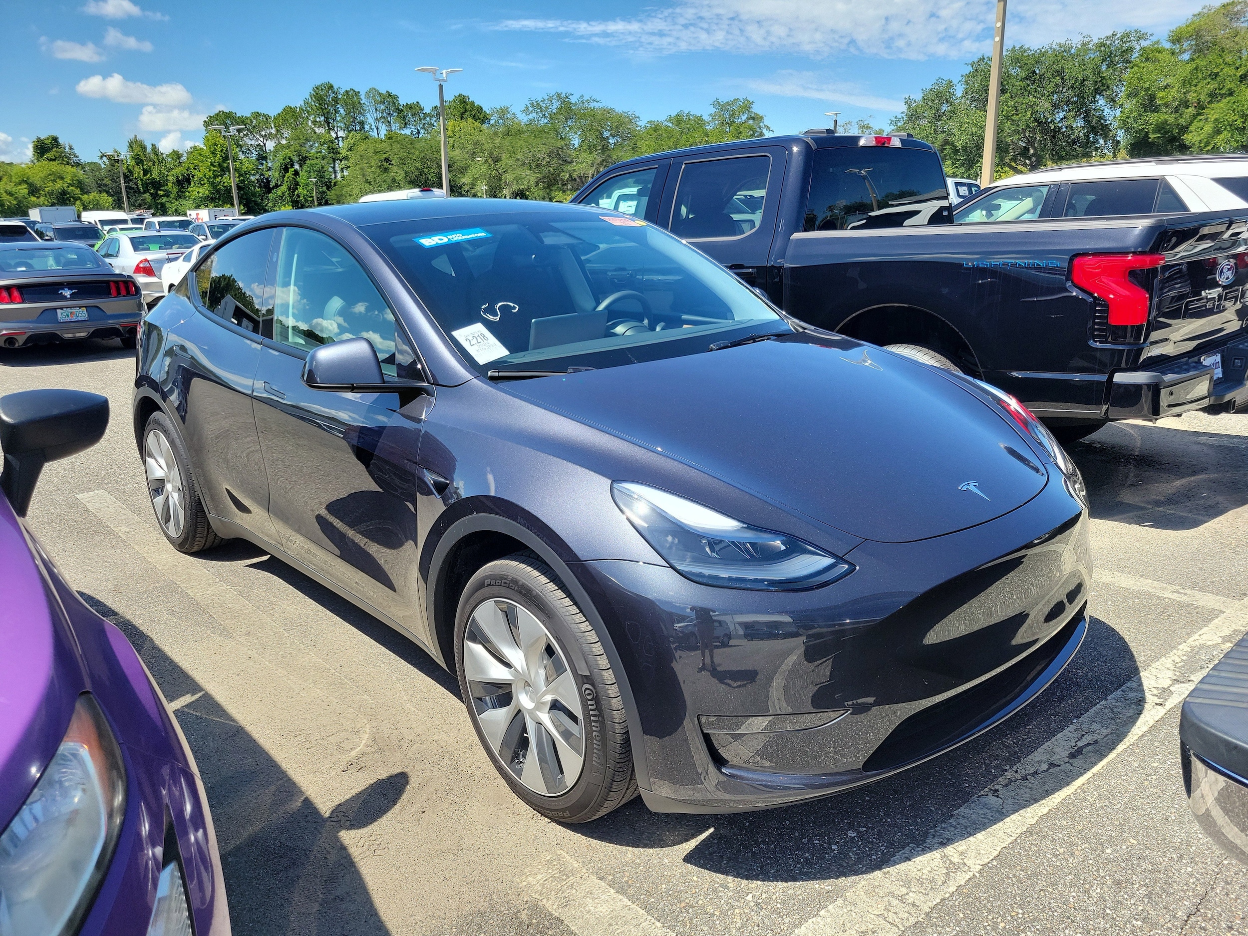 Used 2024 Tesla Model Y Long Range with VIN 7SAYGDEDXRF097968 for sale in Kansas City