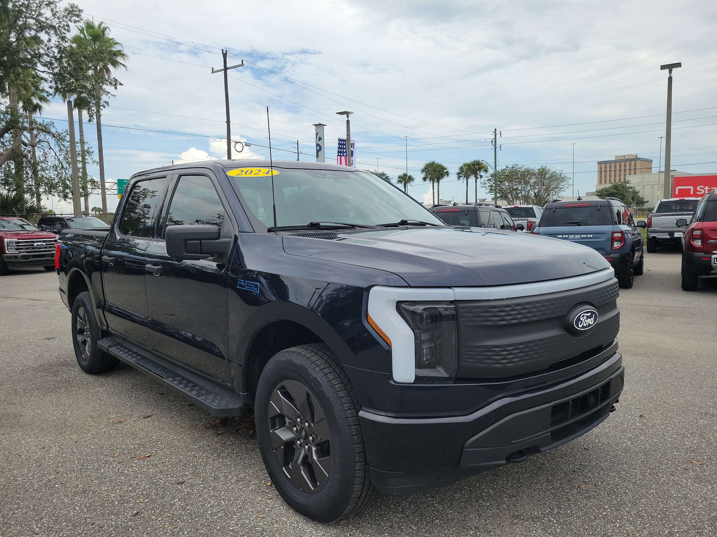 Used 2024 Ford F-150 Lightning XLT with VIN 1FTVW3LK7RWG03654 for sale in Jacksonville, FL