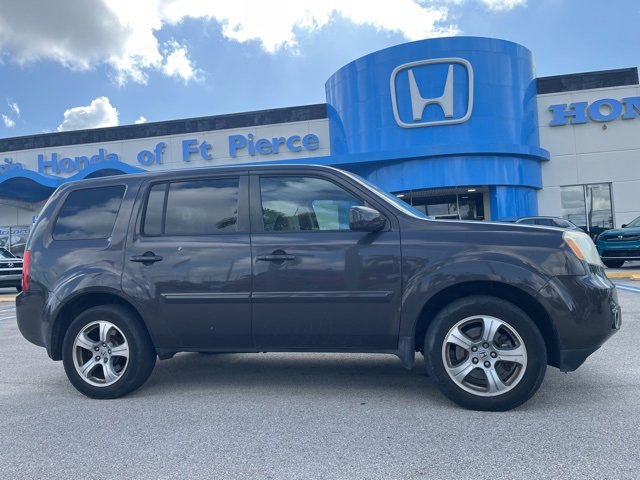 Used 2015 Honda Pilot EX with VIN 5FNYF3H4XFB033186 for sale in Palm Harbor, FL