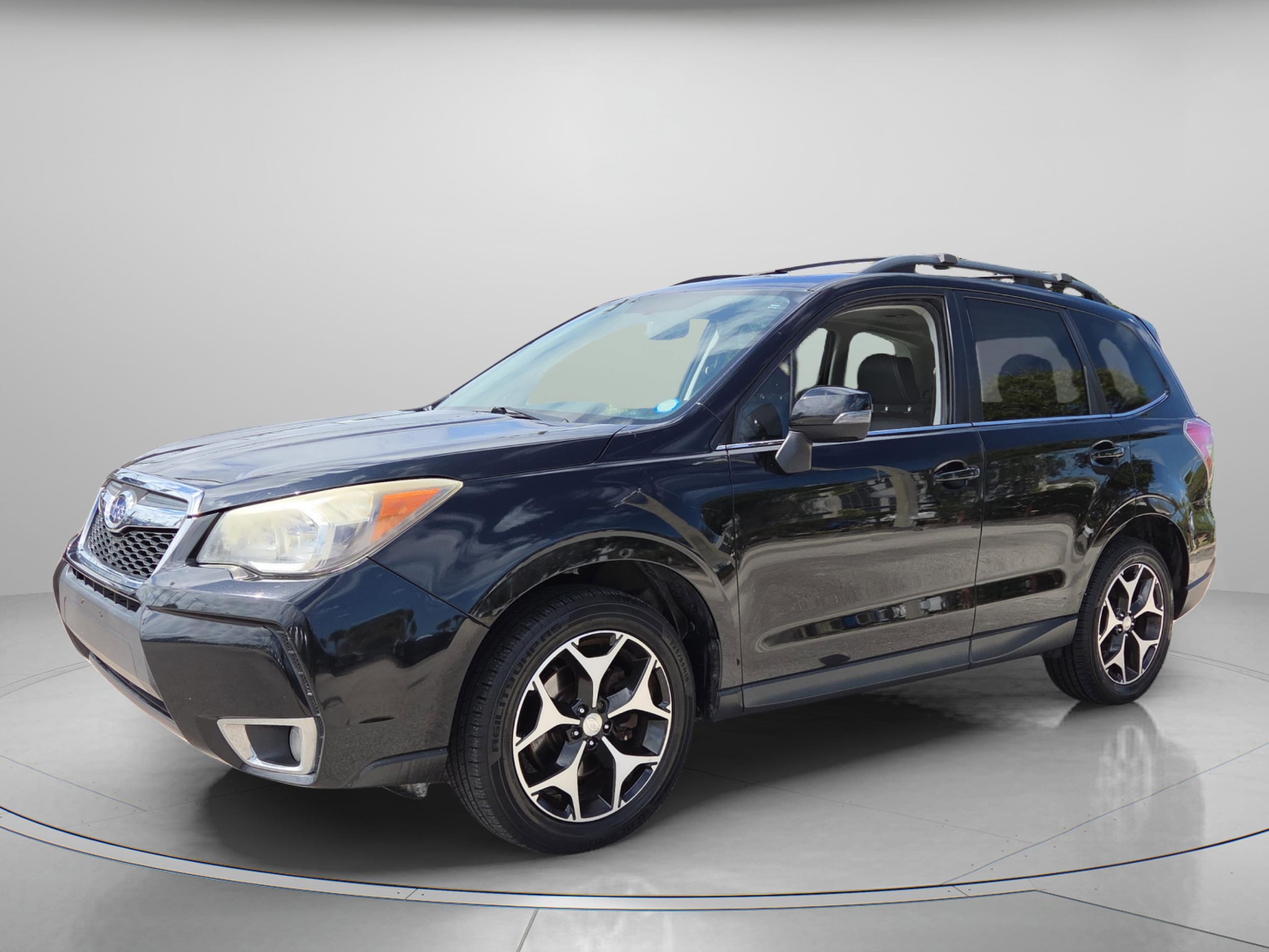 Used 2014 Subaru Forester XT Touring with VIN JF2SJGMC3EH552511 for sale in Fort Pierce, FL