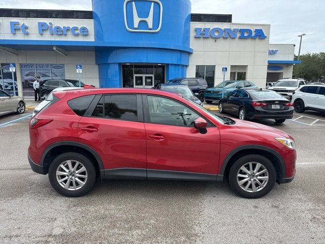Used 2016 Mazda CX-5 Touring with VIN JM3KE2CY1G0882661 for sale in Fort Pierce, FL