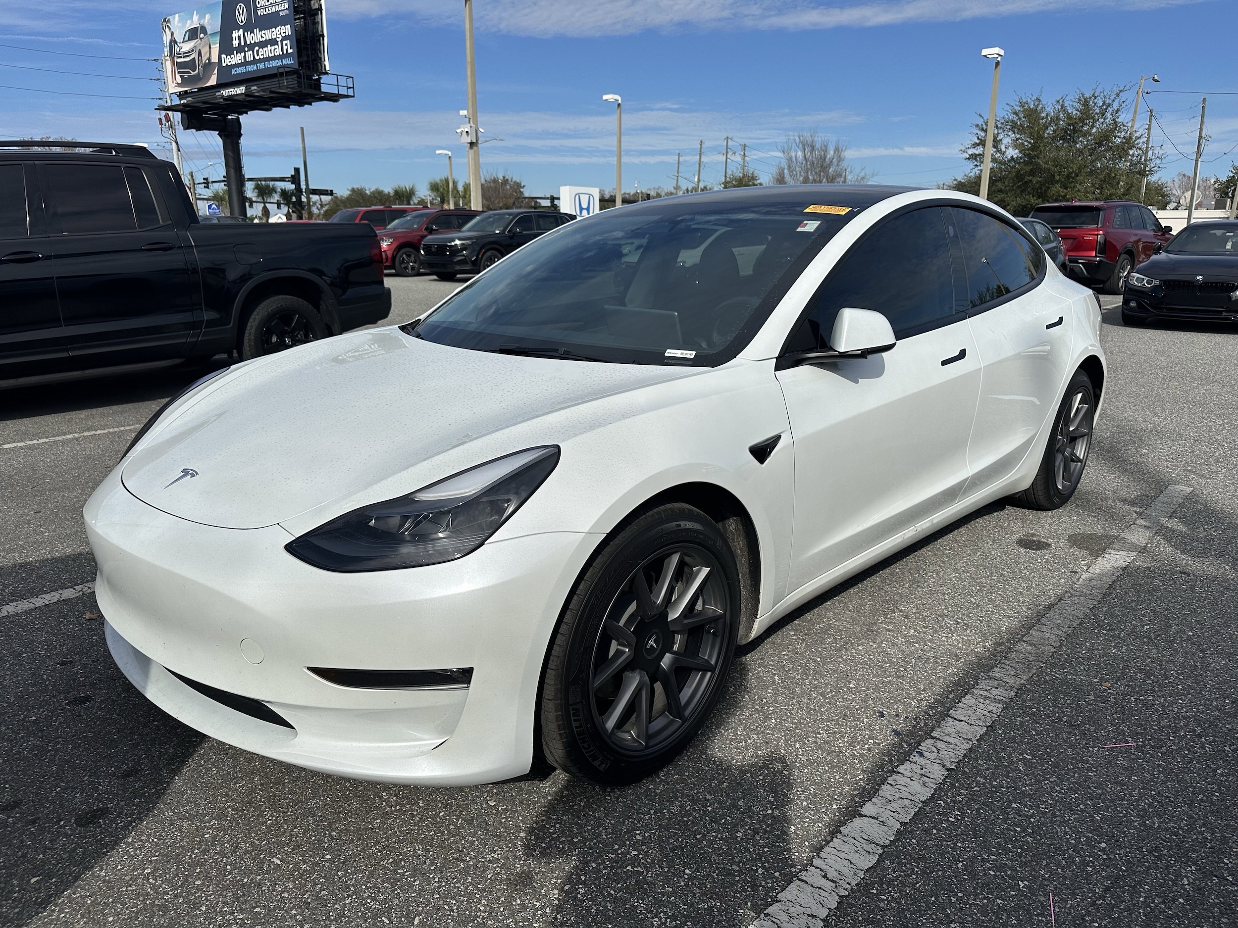 Used 2023 Tesla Model 3 Base with VIN 5YJ3E1EA3PF584072 for sale in Orlando, FL