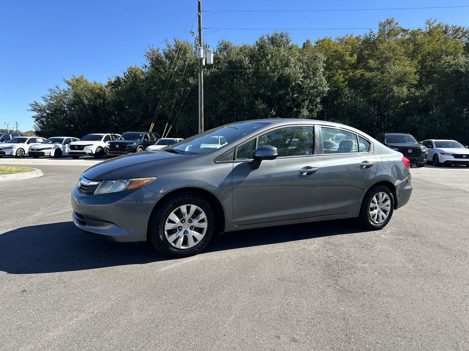 Used 2012 Honda Civic LX with VIN 19XFB2F58CE074703 for sale in Orlando, FL