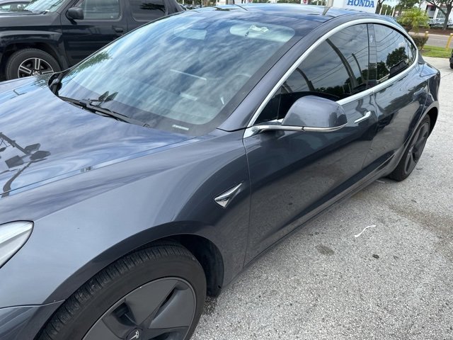 Used 2019 Tesla Model 3 Base with VIN 5YJ3E1EA0KF306559 for sale in Orlando, FL