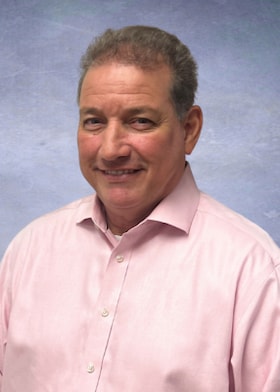 Staff member John McDonough from ID_93ba8df35bdd