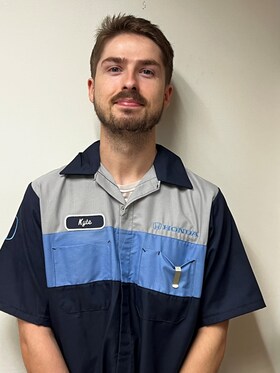 Staff member Kyle Baxter from 03d80ddffa34