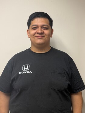 Staff member Christian Gama from 03d80ddffa34
