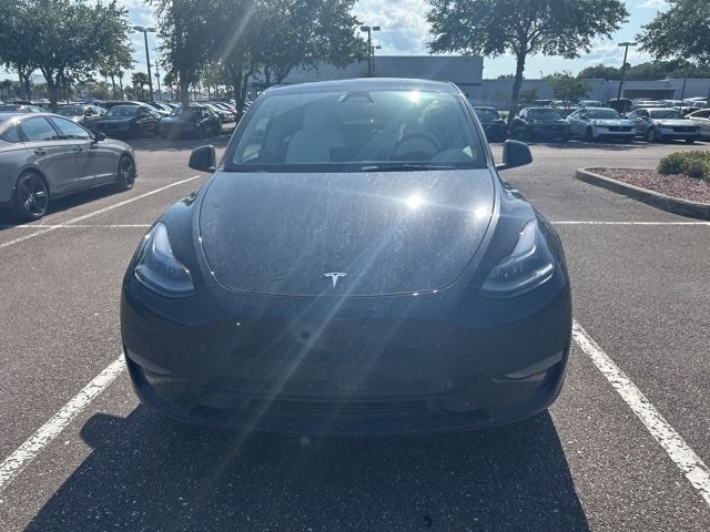 Used 2024 Tesla Model Y Long Range with VIN 7SAYGDEE9RA234890 for sale in Kansas City