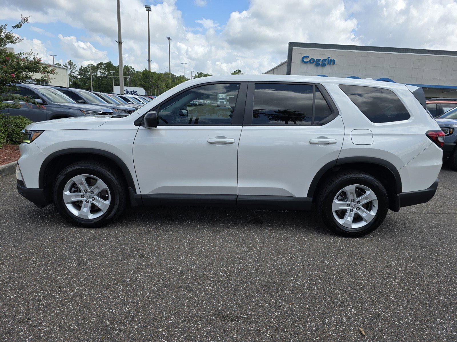 Used 2023 Honda Pilot LX with VIN 5FNYG2H2XPB003970 for sale in Jacksonville, FL