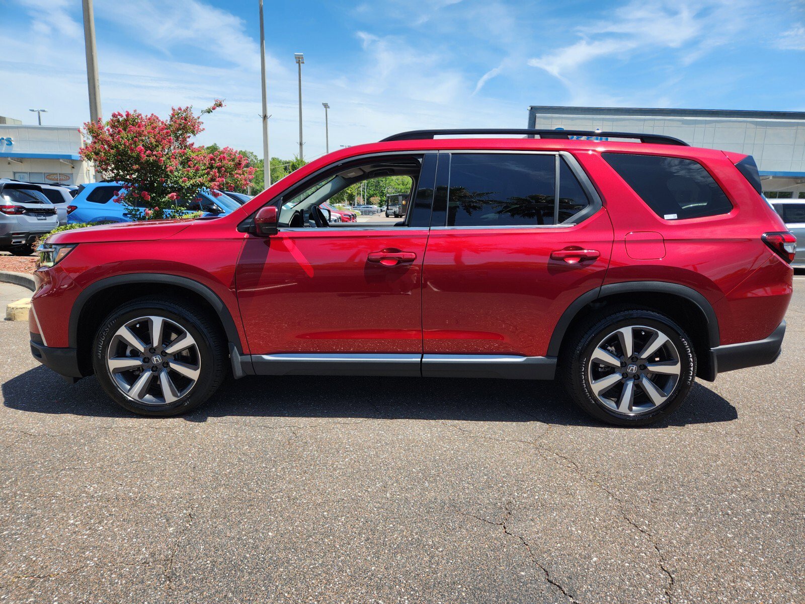 Certified 2025 Honda Pilot Touring with VIN 5FNYG1H72SB037917 for sale in Jacksonville, FL