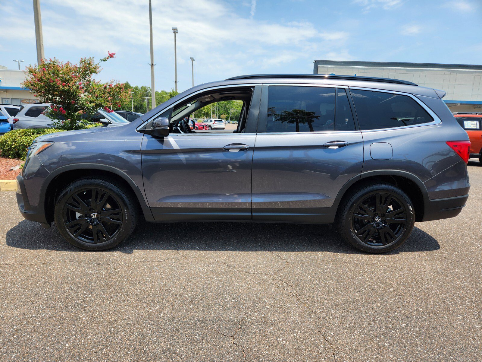 Certified 2022 Honda Pilot SE with VIN 5FNYF5H25NB028230 for sale in Jacksonville, FL