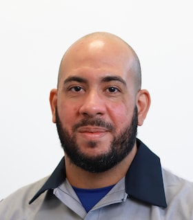 Staff member Jorge Ortiz from ID_38ff4df85935