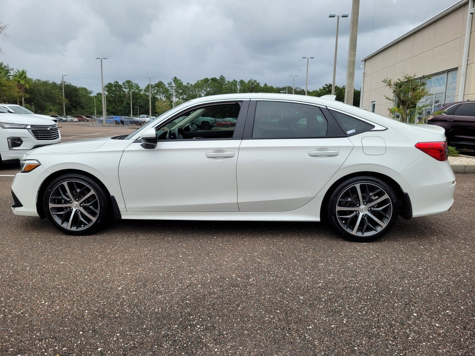 Certified 2024 Honda Civic Touring with VIN 2HGFE1F90RH316841 for sale in Jacksonville, FL