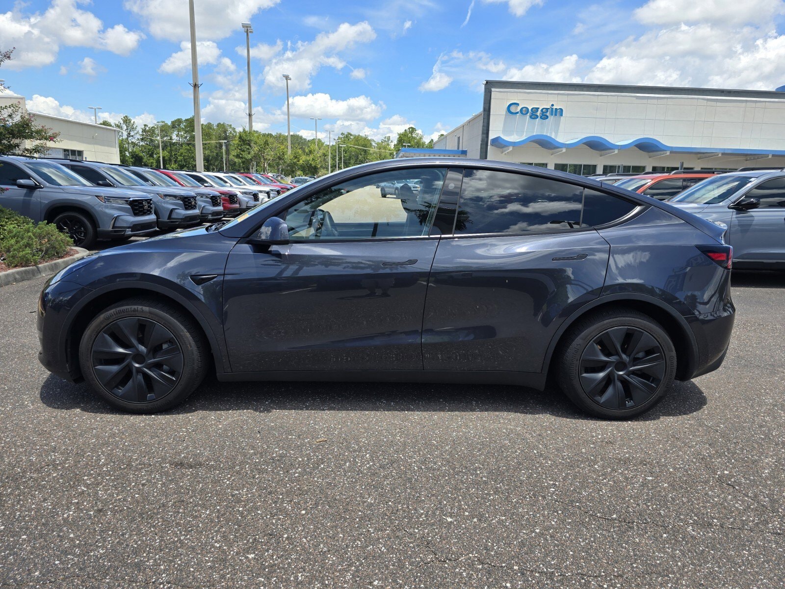 Used 2025 Tesla Model Y Long Range with VIN 7SAYGDED8SA363717 for sale in Jacksonville, FL