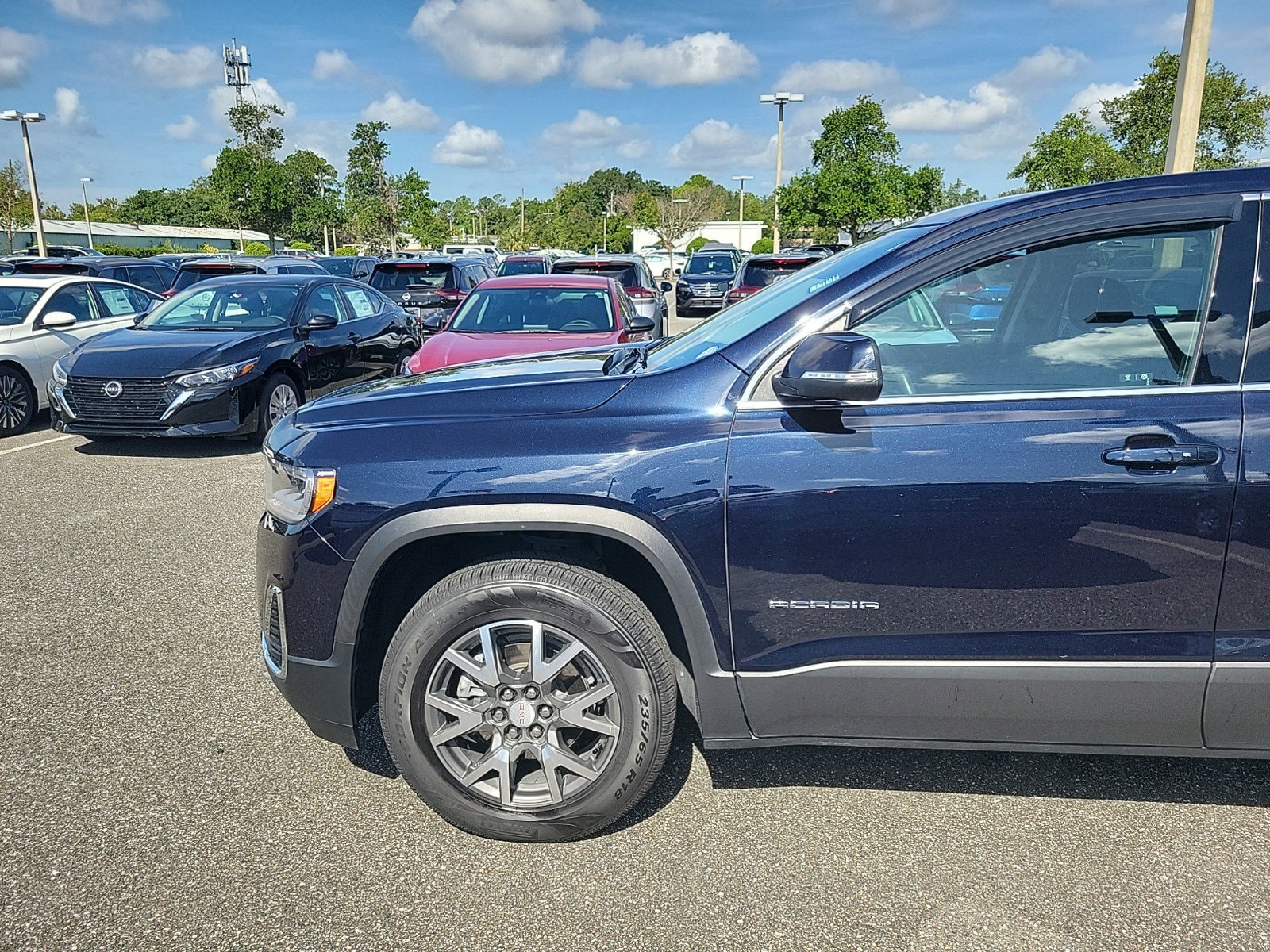 Used 2021 GMC Acadia SLE with VIN 1GKKNKLS2MZ220703 for sale in Jacksonville, FL