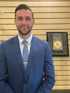 Staff member Dakota Newell from ID_0ba6a634546f