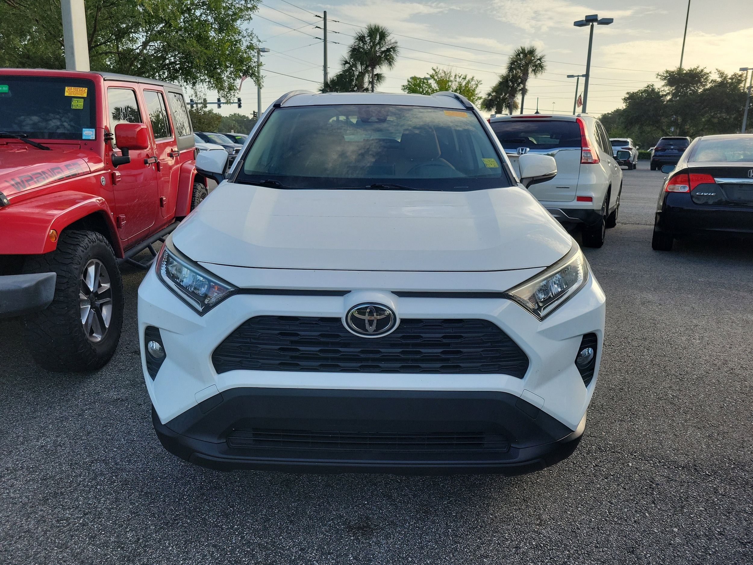 Used 2019 Toyota RAV4 XLE with VIN JTMW1RFV4KD512502 for sale in Jacksonville, FL