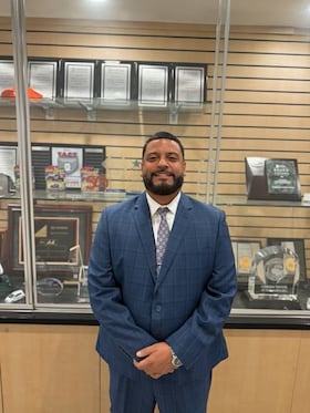 Staff member Felipe Santiago from ID_013ef84b01e9