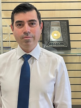 Staff member Carlos Garcia from ID_013ef84b01e9