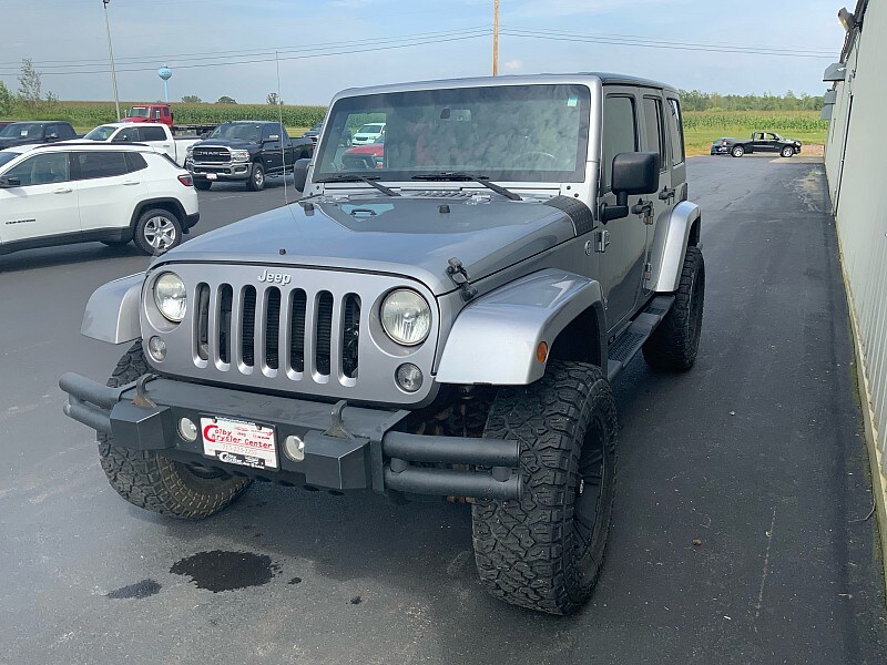 Used 2014 Jeep Wrangler Unlimited Sahara with VIN 1C4BJWEG4EL122882 for sale in Colby, WI