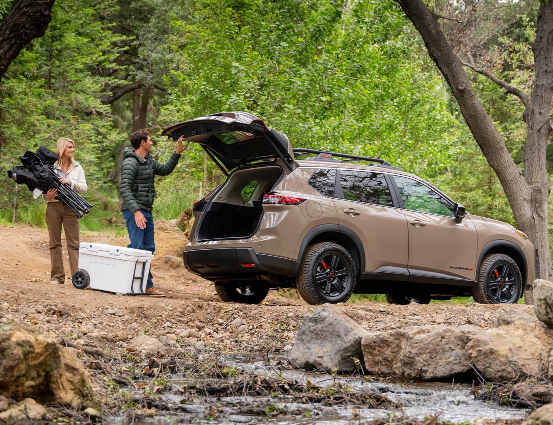 Nissan Rogue parked with rear lift gate open