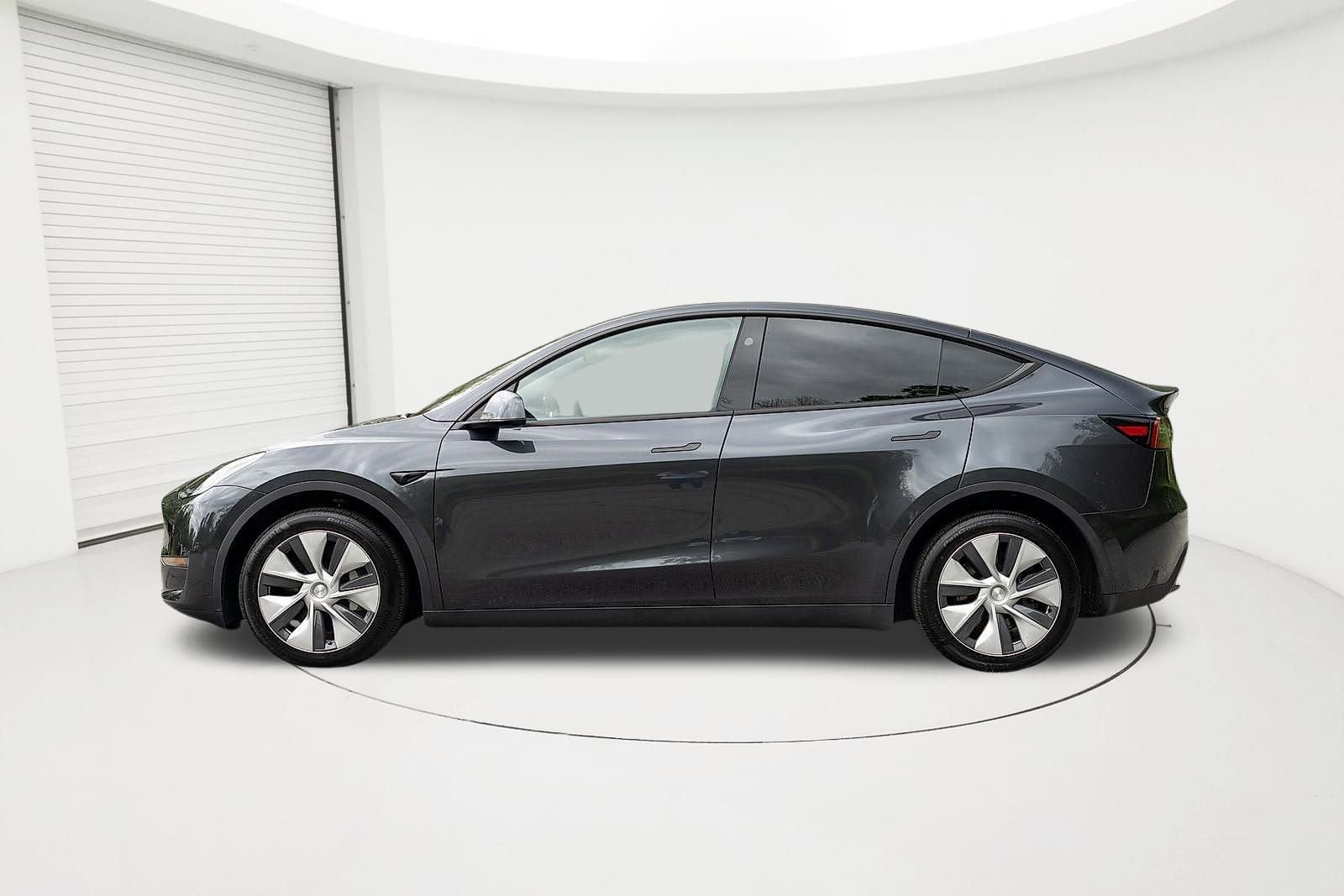 Used 2024 Tesla Model Y Long Range with VIN 7SAYGDEE2RF036980 for sale in New London, CT