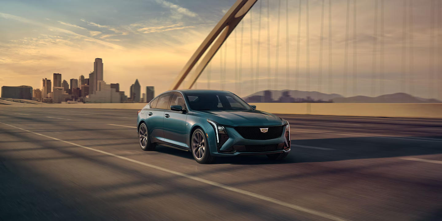 Cadillac CT5 driving over a bridge