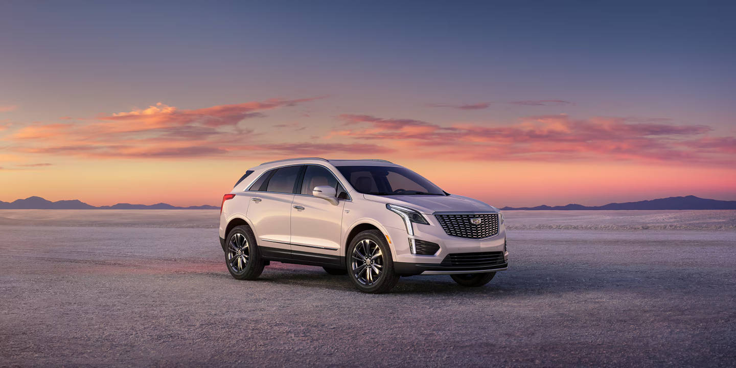 Cadillac XT5 parked with sunset in the background