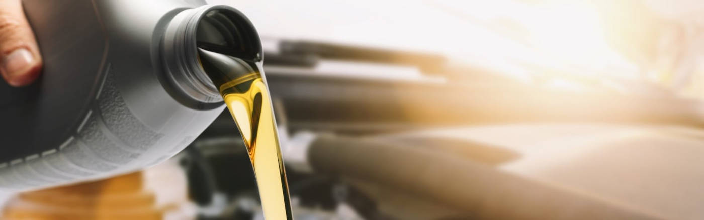 Oil being poured into an engine