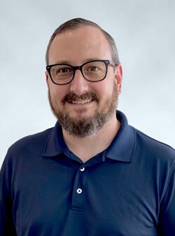 Staff member Tim Laducer from ID_2374f98cce96