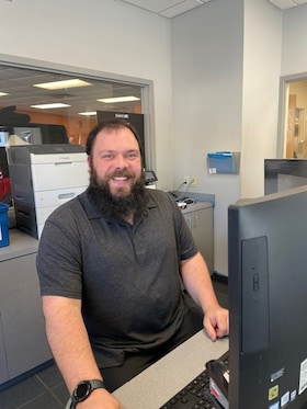 Staff member Adam Parker from ID_dc243ffa6aeb
