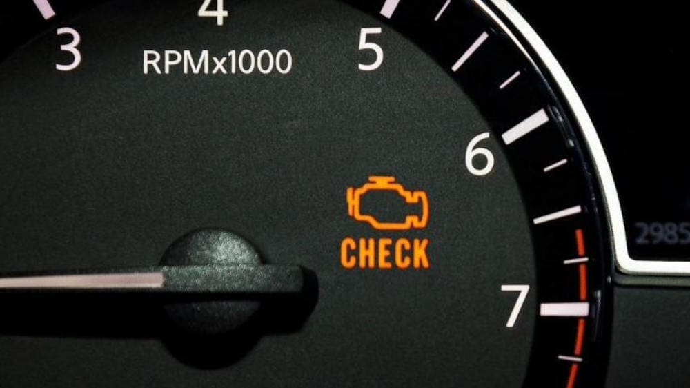 Check Engine light on a dashboard
