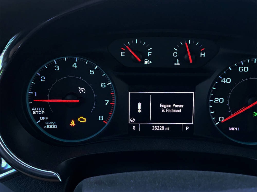 Check Engine light on a dashboard