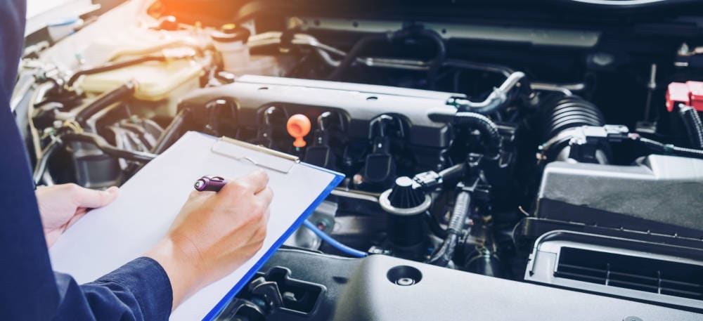 Close p of Hyundai engine with a clipboard