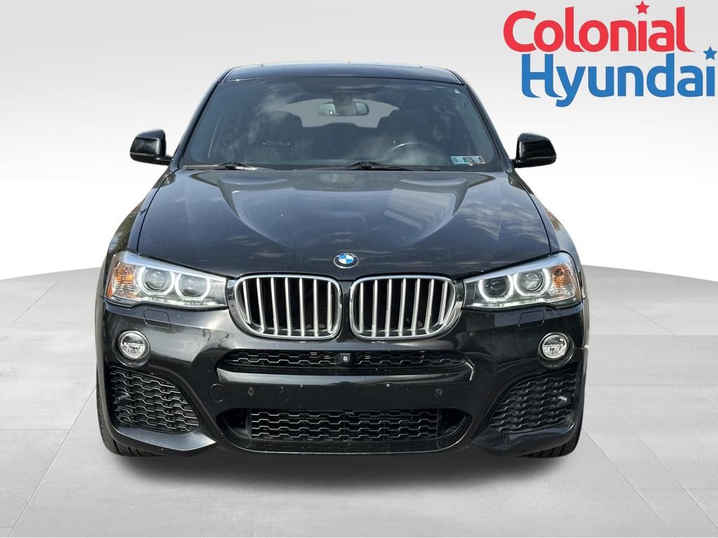 Used 2015 BMW X4 xDrive28i with VIN 5UXXW3C59F0F88772 for sale in Downingtown, PA