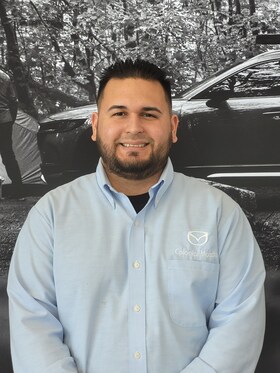 Staff member Andy Cruz from bee51968f7b7