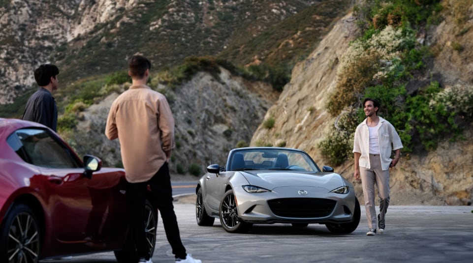 2026 Mazda MX-5 Miata convertible driving scene at Colonial Mazda.
