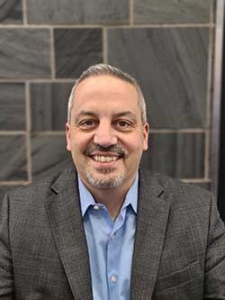Staff member Corey Henderson from ID_ee07a34a8c49