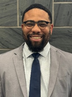 Staff member Q. Gordon from ID_ee07a34a8c49