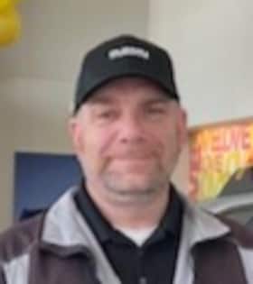 Staff member Dennis McGettigan from c19e820ea79b