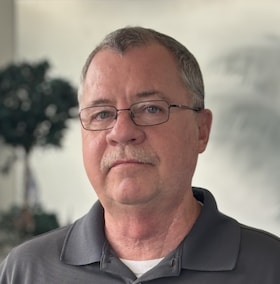 Staff member Warren Simcox from 323b061c13af