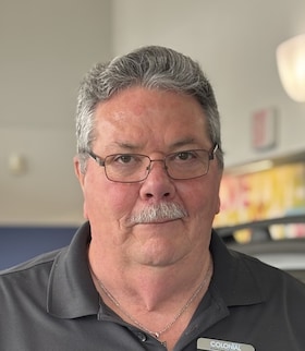 Staff member George Turner from ID_001c5e93a762