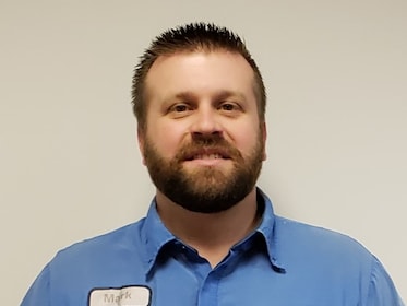 Staff member Mark Mueller from ID_1cec949b3aa4