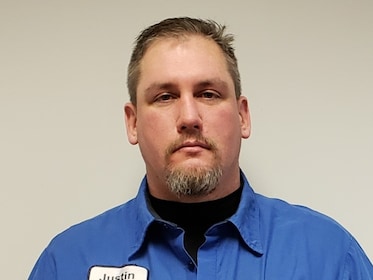 Staff member Justin Reichert from ID_2af06ba54b7a