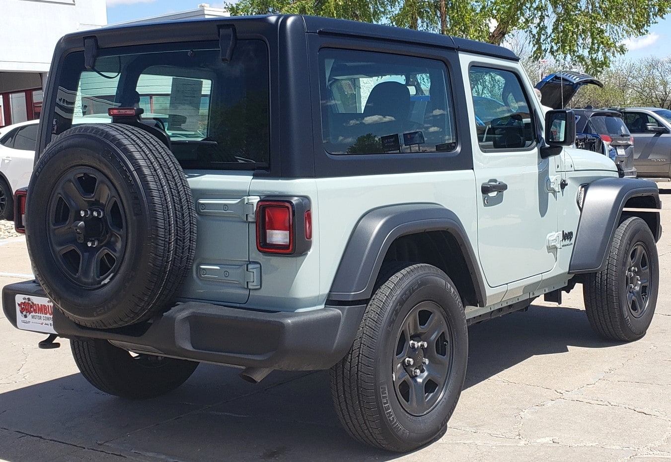 Used 2023 Jeep Wrangler 2-Door Sport with VIN 1C4GJXAGXPW623455 for sale in Columbus, NE